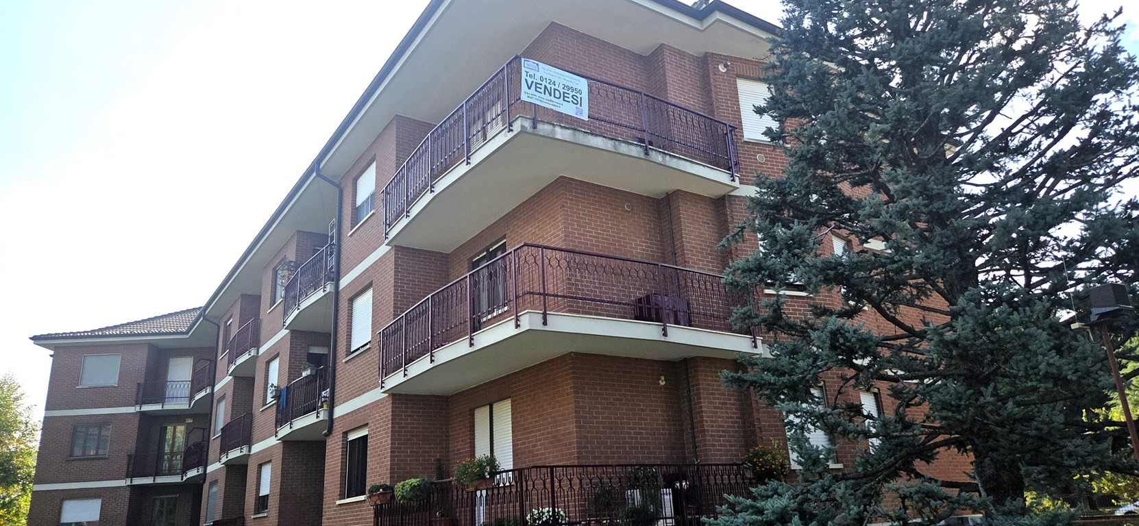 Luminoso quadrilocale con mansarda e box auto